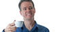 A man holding a cup of coffee