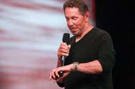 Ellison with watch photo by drserg via Shutterstock