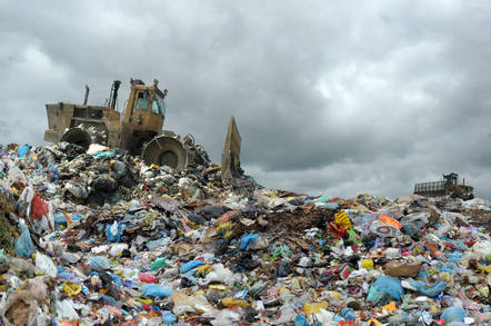 A bulldozer in a dump