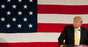 Trump with flag photo via Shutterstock