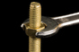 Spanner and bolt photo via Shutterstock