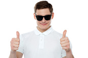 Double thumbs up photo via Shutterstock