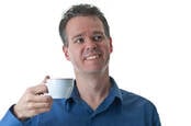 A man holding a mug of coffee