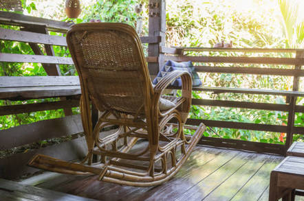Rocking chair on porch. Photo By Tapui/shutterstock
