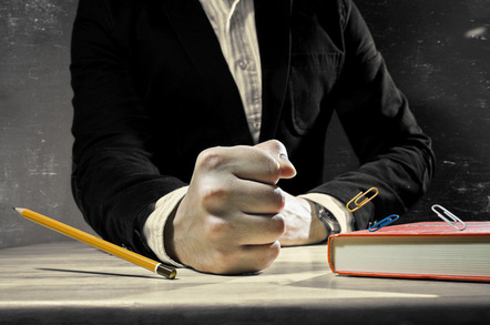 Punching desk photo via Shutterstock