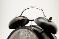 Alarm clock photo via Shutterstock