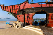 Pirate ship in Croatia with a hole blown through it. For editorial use only. Photo by shutteretsock/s-mart