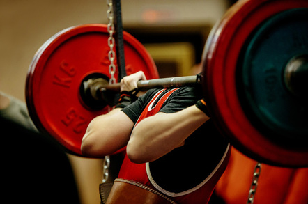 Weight lifter photo via Shutterstock