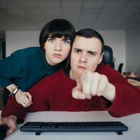 people peer into camera. photo by shutterstock