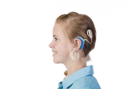 Young girl with a cochlear implant. Photo by shutterstock/Elsa Hoffmann