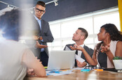 business meeting, debate over data. Photo by shutterstock