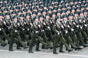 Soliders marching photo via Shutterstock