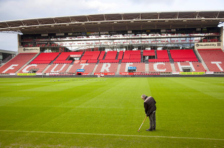 Football stadium photo via Shutterstock