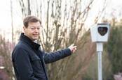 Mats Jarlstrom, pointing to a traffic light camera