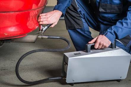 a car being tested for emissions compliance