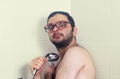 Nerd in shower photo via Shutterstock