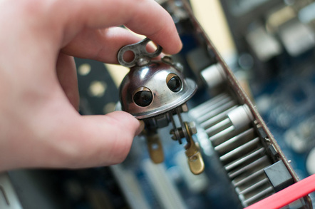 Tiny robot photo via Shutterstock