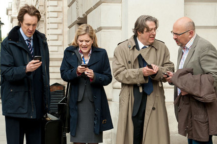 Screengrab from the Thick of IT - Brit govt satirical comedy show. Cast text furiously while in crisis mode.