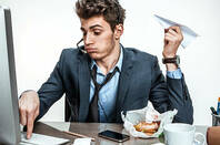 Idiot procrastinating at desk