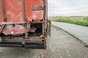 Broken container photo via Shutterstock