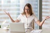 Woman annoyed at computer