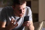 Man rages at mobile phone