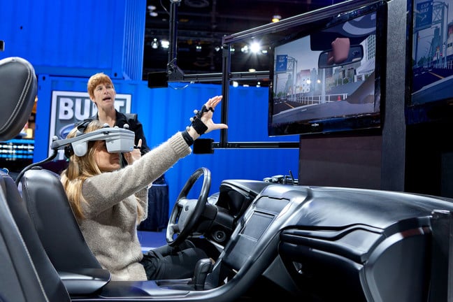 A Ford employee demonstrates a new virtual reality technology at the 2012 Chicago Auto Show Media Preview on February 9, 2012 in Chicago, Illinois.