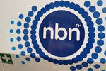 NBN truck side with First Aid sticker