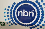 NBN truck side with First Aid sticker