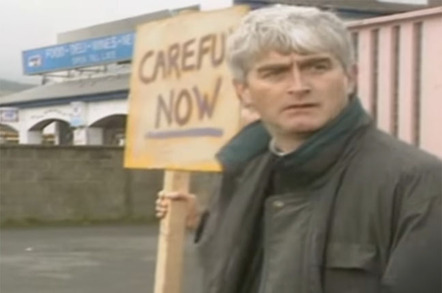 Father Ted protests with "down with this sort of thing" placard.