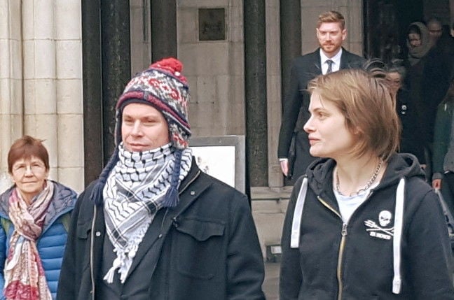 Lauri Love and girlfriend Sylvia Mann leaving the Royal Courts of Justice. Pic: Richard Priday