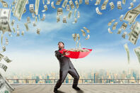 man gathers money in an umbrella