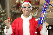 ajit pai in a santa suit