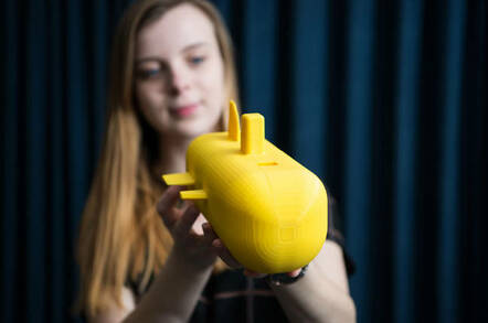 DSTL apprentice Verity Jackson with Jacob's little yellow submarine. Crown copyright/DSTL