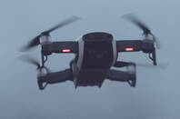 A DJI Spark drone in flight