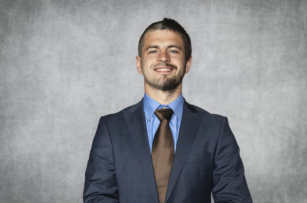 executive has half of his face shaved with a short haircut, and half beardy with shaggy hair - rebrand image concept