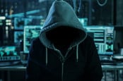 Archetypal hacker in a hoodie (is this how we all must surf pron from now on?)
