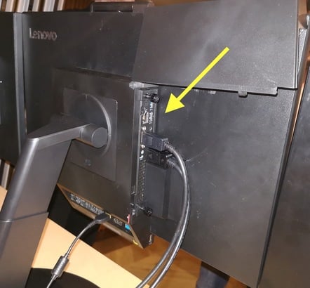 Lenovo ThinkCentre attached to monitor