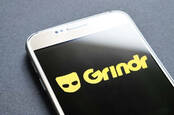 The Grindr app on a smartphone -image via shutterstock