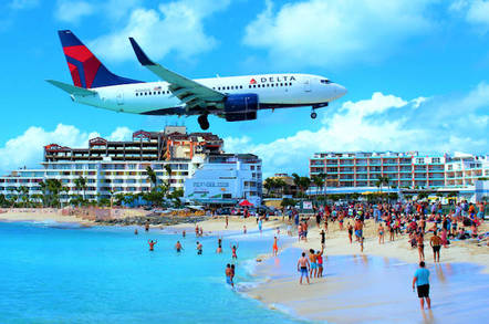 Delta flight over a beach