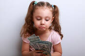 A child unhappy with her cash stash