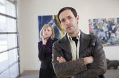 two people 'appreciating' art in a gallery... look a bit pretentious doing so.
