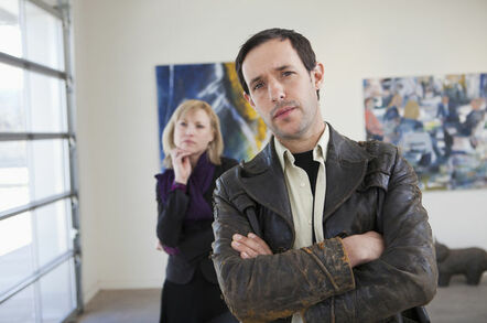 two people 'appreciating' art in a gallery... look a bit pretentious doing so.