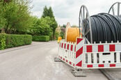 Fiber optic cable for fast internet - laying cable in residential area