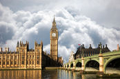 Scene of Big Ben and Palace of Westminster seen from South Bank, Dramatic cloudy Sky in the background.