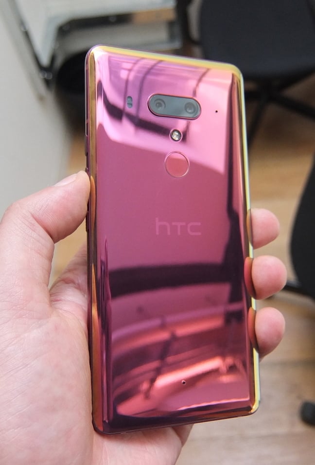HTC U12 Plus Red in hand