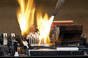 A blowtorch burning a computer board
