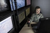 military staffer looks at monitor (drones)