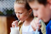 kids drink milkshake