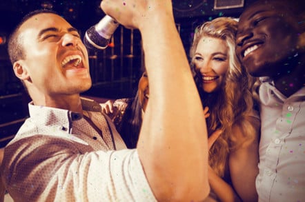 Friends singing at karaoke